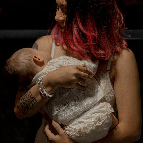 Mom with dyed hard and baby